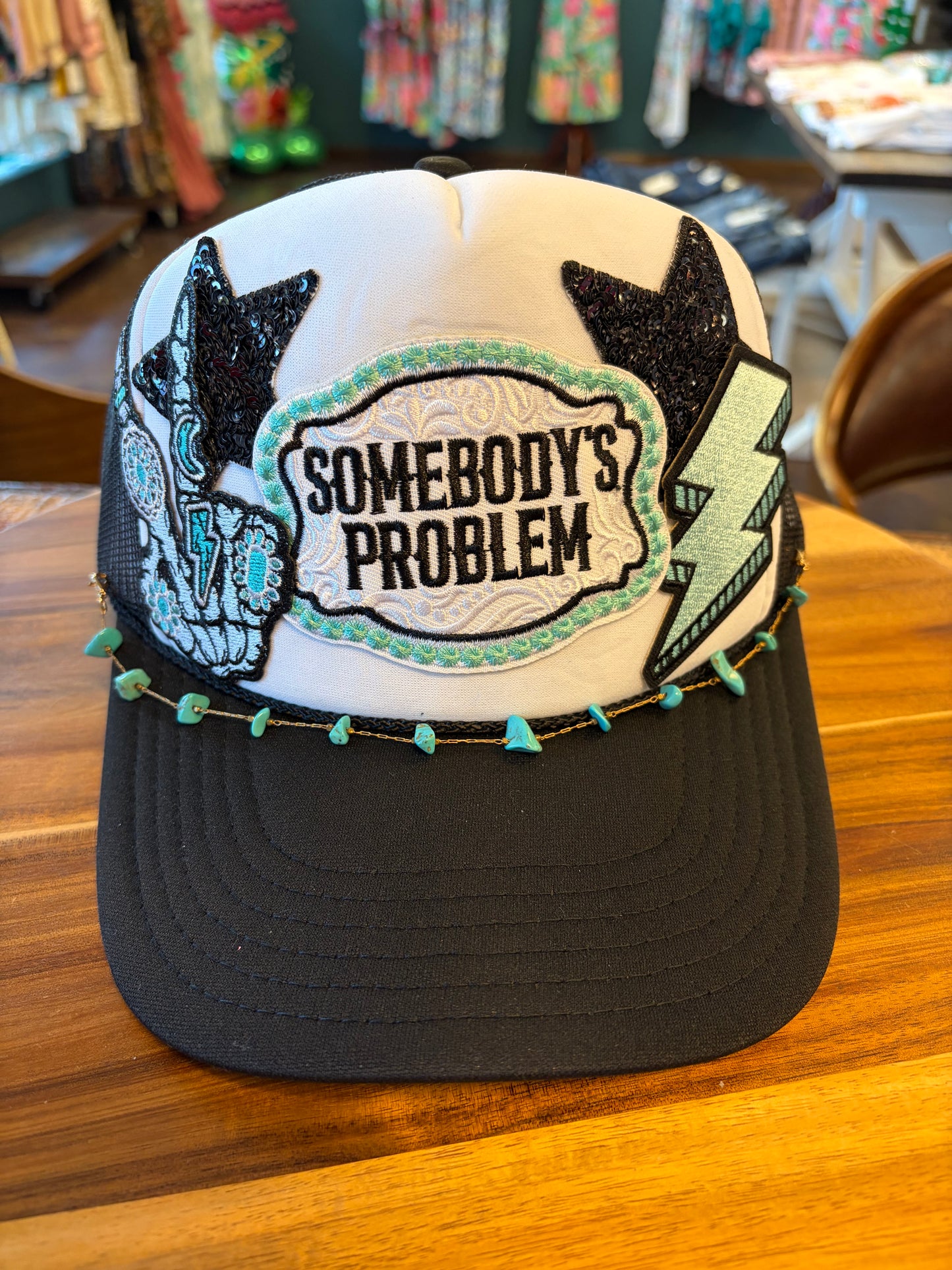 Somebody’s Problem Trucker Hat